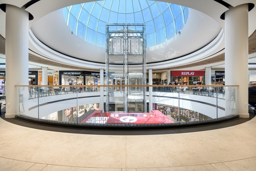 TL-3030 | Glass Profile | glass balustrade | shopping center |  monted on concrete